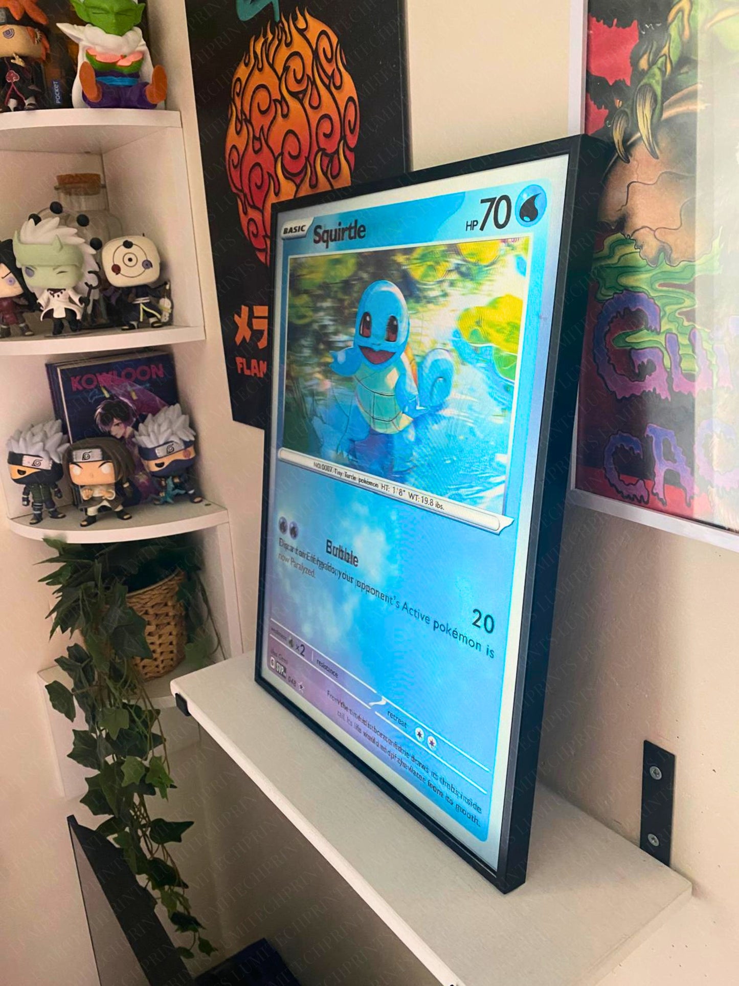 Pokemon Charmander Squirtle Bulbasaur 3D lenticular poster displayed on wall - gaming room decor